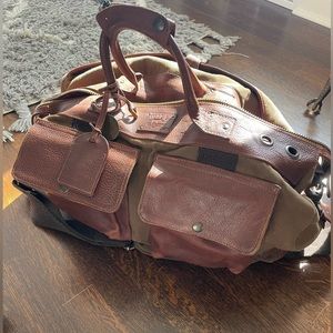 Will leather goods duffel bag and travel pillows